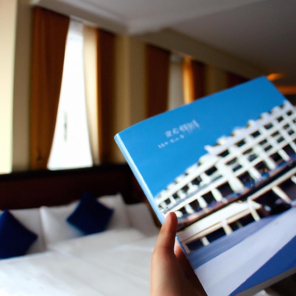 Person holding a hotel brochure